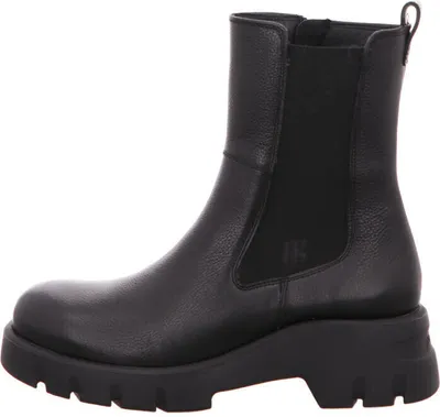 A black leather boot on a white background.