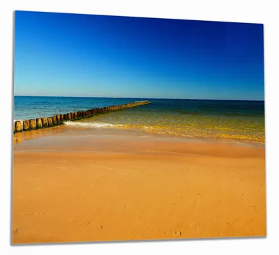 Produktbild von Wallario Herdabdeckplatte aus Glas, Größe 60 x 52 cm 1-teilig, Motiv Sandstrand in orange - Blaues Meer - Blauer Himmel