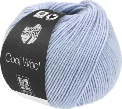 A ball of light blue yarn with a black label.