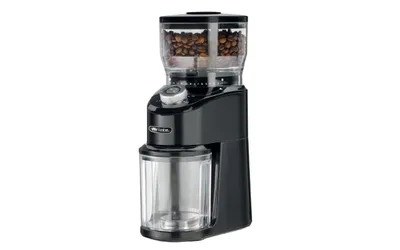 A black electric coffee grinder with a transparent bean hopper and collection container, set against a white background.