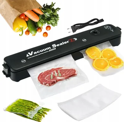 A black vacuum sealer is shown with various food items being sealed, including steak, oranges, and asparagus. A paper bag filled with vegetables is also visible.