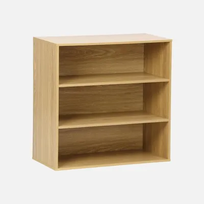 A three-shelf wooden bookshelf against a light gray background.