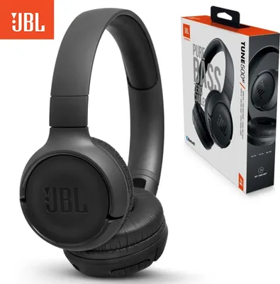 A black JBL T500 on-ear headphone is shown next to its packaging.