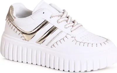 A single white sneaker with gold accents is shown against a white background.