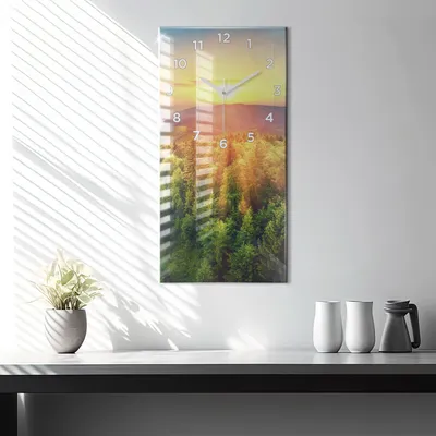 Produktbild von Wallfluent Wanduhr – Stilles Quarzuhrwerk - Uhr Dekoration Wohnzimmer Schlafzimmer Küche - Zifferblatt - weiße Zeiger - 30x60 cm - Sonnenuntergang über den Hügeln