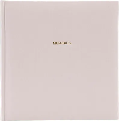 A closed album with the word "Memories" printed on the cover.