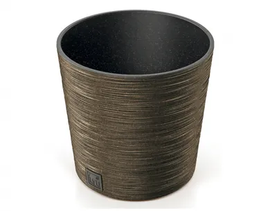 A close-up studio shot of a round planter pot with a textured wood-like finish.
