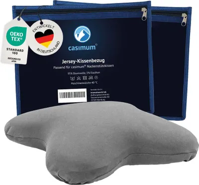 A gray pillow and its packaging are displayed against a white background.