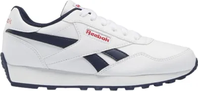A side view of a white Reebok athletic shoe with navy blue accents and red branding.