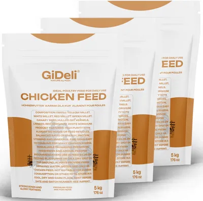 Three bags of chicken feed are arranged diagonally in the foreground.