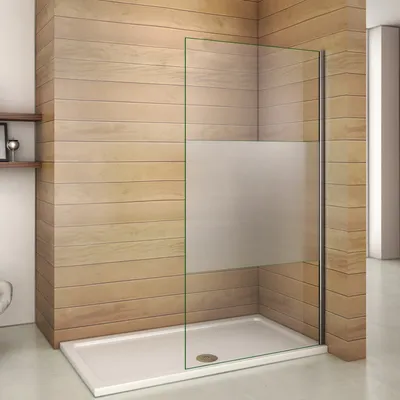 A modern shower enclosure with a frosted glass panel, set against a wood-paneled wall.
