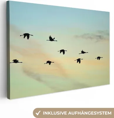 Zdjęcie produktu dla MuchoWow® - Obraz na płótnie - Żółto-niebieskie niebo z ośmioma żurawiami, fototapeta, dekoracja ścienna do salonu, 30x20cm