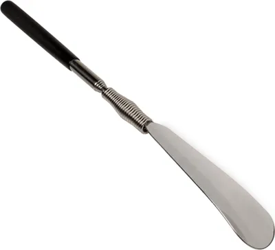 A shoehorn with a black handle and a metal scoop, against a white background.
