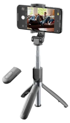 A selfie stick with a phone attached, showing a scene on the phone's screen.
