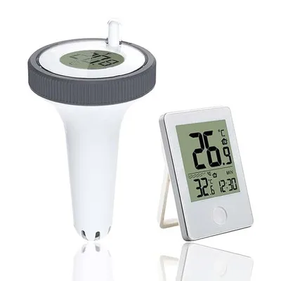 A floating thermometer and a separate digital thermometer.