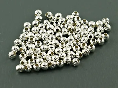 Produktbild von Vintageparts Zwischenperlen geprägt silberfarben rund 4 mm für Ketten und Armbänder, 100 Stück