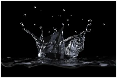 Produktbild von Wallario Premium Glasbild, freischwebende Optik, kräftige Farben, Größe 90 x 60 cm Motiv Aufspritzendes Wasser