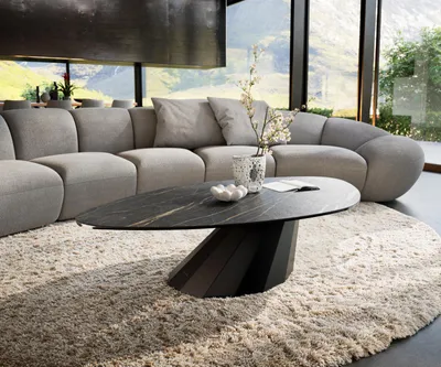 Produktbild von DELIFE Couchtisch Edge Organisch 140x76 cm Keramik Laminam® Noir Desir Braun Parabi Metall Schwarz