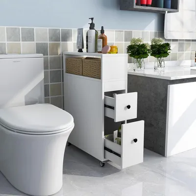 A bathroom scene with a toilet and a narrow storage cabinet.