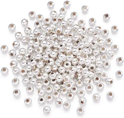 Productafbeelding van Ronde metalen afstandhouders - Voor sieradenproductie - Gepolijst - 200 stuks, 5 mm - Zilverkleurig