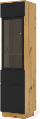A tall, narrow display cabinet with a glass door and two solid doors/drawers below, set against a white background.
