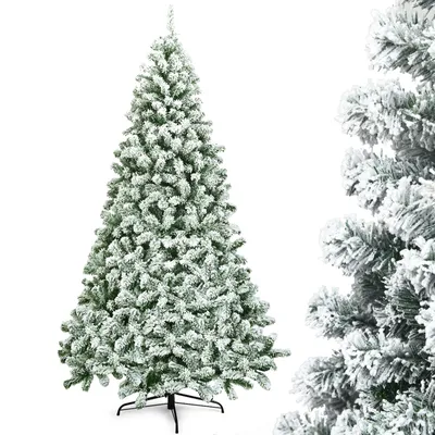 A full shot of a flocked artificial Christmas tree on a white background.