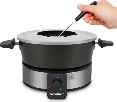 Produktbild von Cloer 6679 Fondue für 8 Personen, beschichteter Aluminiumtopf, inklusive Spritzschutz, 8 farbig markierte Gabeln 1,5 Liter, 1000 W, silber, schwarz