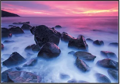 Produktbild von Wallario Wandbild Felsen im Meer bei Sonnenuntergang, Größe: 70,30 x 100,30 cm, Poster mit schwarzem Aluminiumrahmen