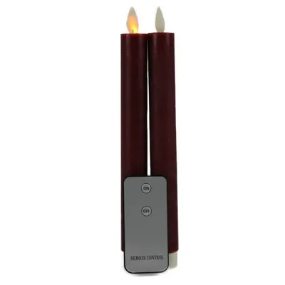 Two red LED taper candles with a remote control.