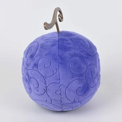 A plush toy resembling a devil fruit from the anime One Piece, shown against a plain white background.