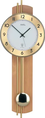 A pendulum clock with a wooden casing and a gold-colored frame around the clock face.