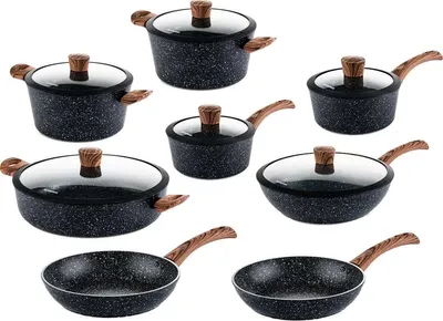 A collection of cookware items arranged on a white background.