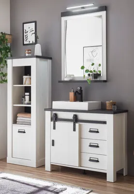 A modern bathroom vanity set with a sink, mirror, and storage cabinet.