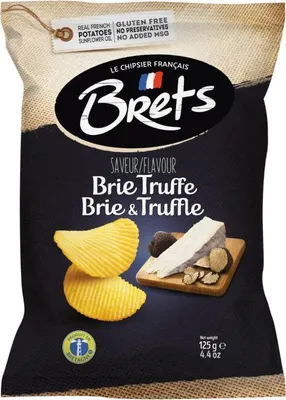 A bag of potato chips with a depiction of brie cheese and truffles.