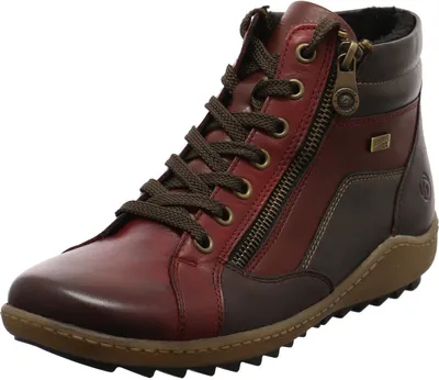A single red and brown women's boot is shown against a white background.
