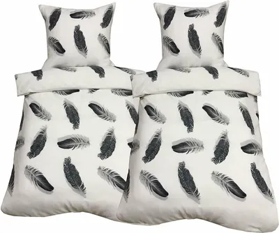 Two sets of bedding with a feather pattern, including duvet covers and pillowcases, displayed on a white background.