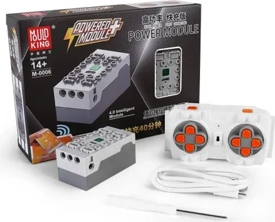 The image shows the packaging and contents of a Mould King M-0006 4.0 Powered Module set, including the power module itself, a remote control, and a charging cable.