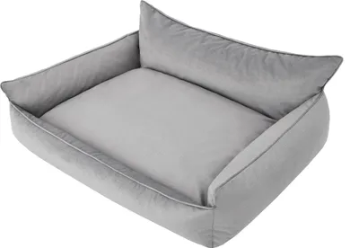 A gray dog bed with raised sides and a cushioned center.