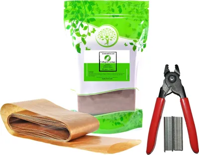 A product shot of sausage casing, a sausage clipper, and clips, with a bag of collagen casing in the background.