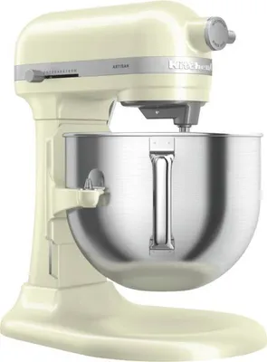 A cream-colored KitchenAid Artisan stand mixer with a silver bowl is shown against a white background.