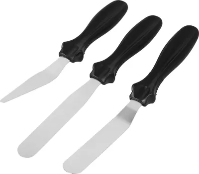 Three offset spatulas with black handles are arranged diagonally against a white background.