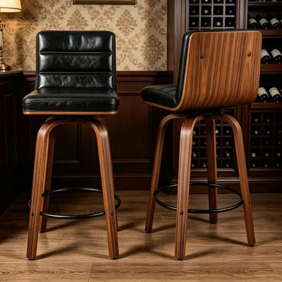 Immagine prodotto di Set di 2 sgabelli da bar MODFU con sedile girevole a 360°, base sagomata con poggiapiedi e schienale imbottito, colore nero e marrone