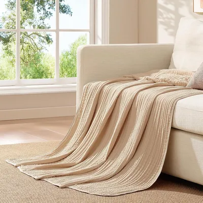 Produktbild von Musselin Decke aus 100% Baumwolle, dekorative Kuscheldecke und Wohndecke für das Sofa, leichte atmungsaktive Ganzjahresdecke in Beige, 150x200 cm