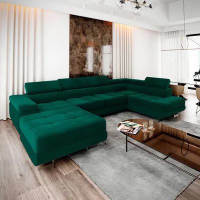 A luxurious green sectional sofa in a modern living room setting.