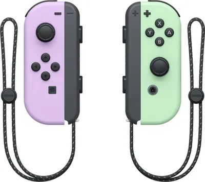 A pair of Nintendo Joy-Con controllers, one purple and one green, are shown against a white background.