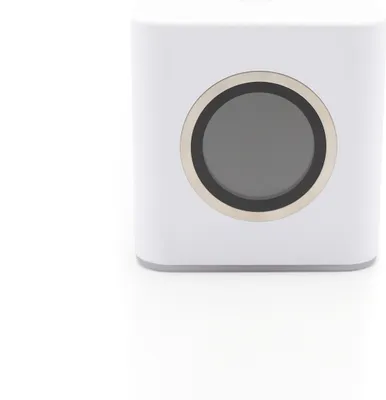 A white cube-shaped router with a circular display is shown against a white background.