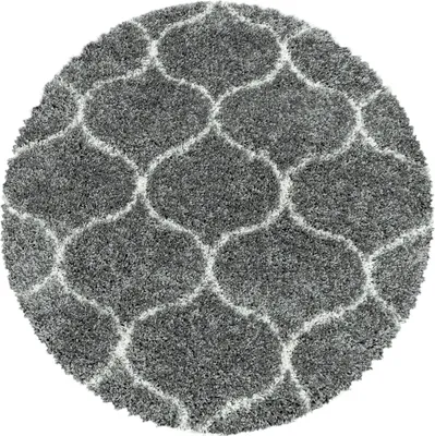 A round, gray rug with a white geometric pattern is shown from a top-down view against a white background.