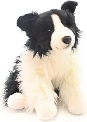 A plush toy Border Collie dog sitting against a white background.