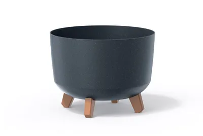 A dark gray planter pot with three wooden legs, isolated on a white background.