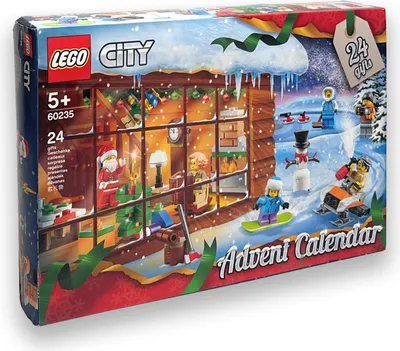 The image shows the front of a LEGO City Advent Calendar box, depicting a winter scene with a log cabin and various festive elements.